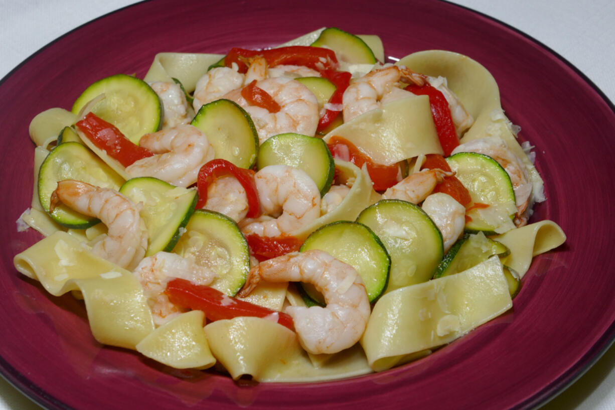 Paparedelle with shrimp, zucchini and sweet peppers.