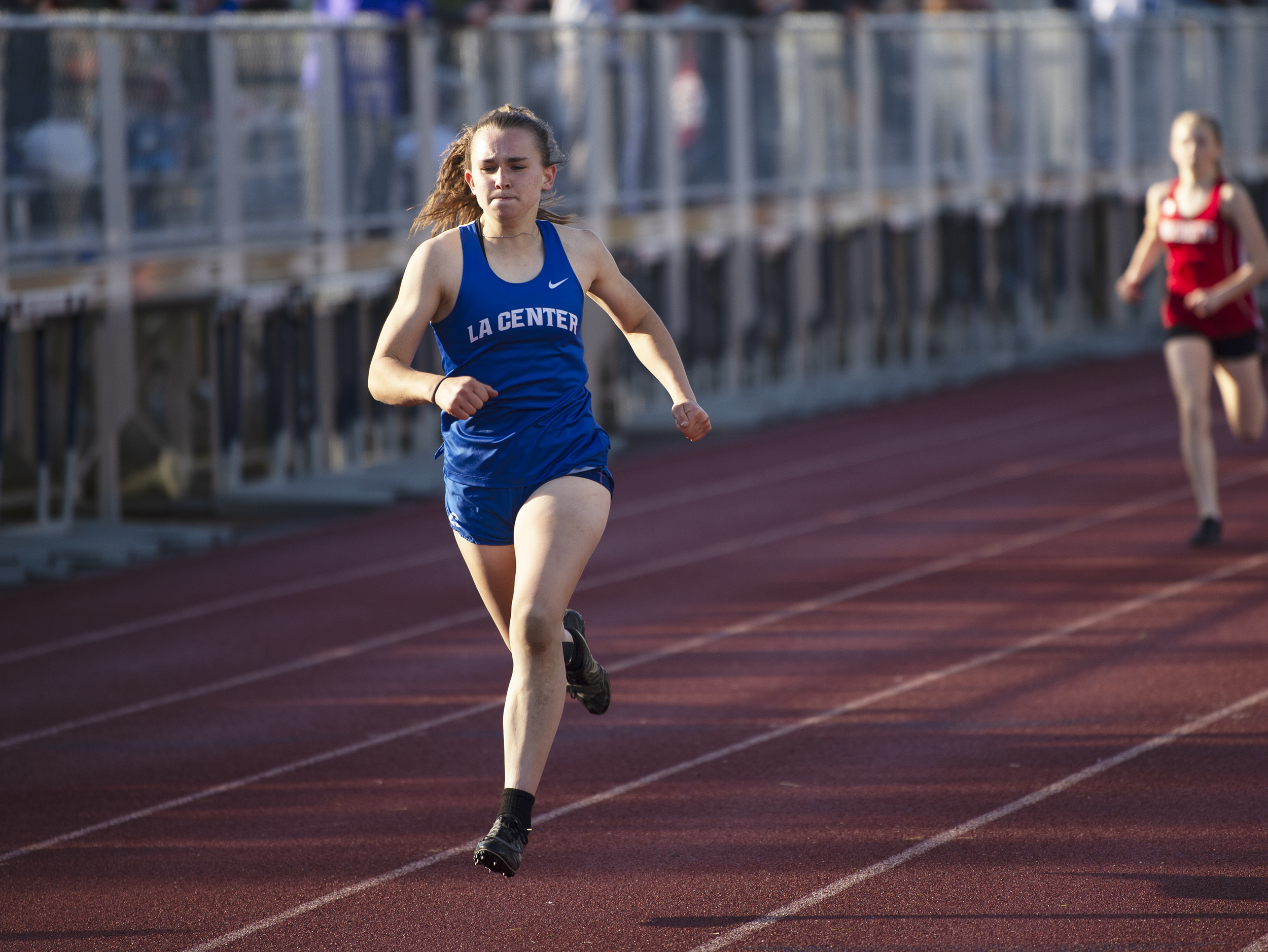 La Center's Shaela Bradley runs to victory in the girls 400 meters at the Class 1A District 4 track and field meet at Seton Catholic on Thursday, May 19, 2022.