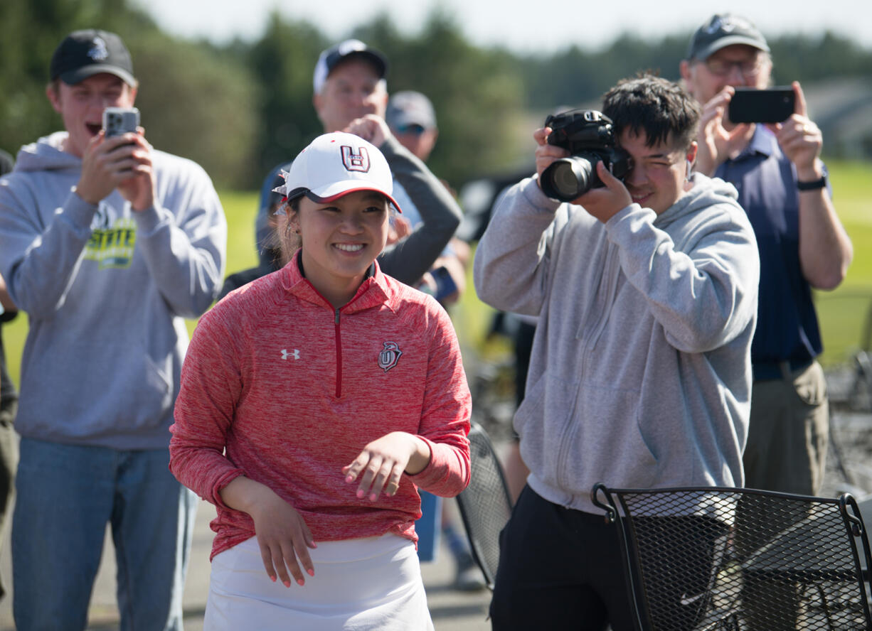 Supporters cheer for Union junior Jade Gruher after she was announced as the individual champion of the Class 4A girls golf tournament on on Wednesday, May 25, 2022, at Hawks Prairie Golf Course in Lacey.