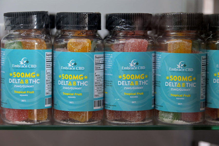 Bottles of gummies, fortified with Delta-8 are sold at three Embrace CBD stores owned by Nicholas Patrick, who thinks the growing market for Delta-8 needs regulation instead of a ban.