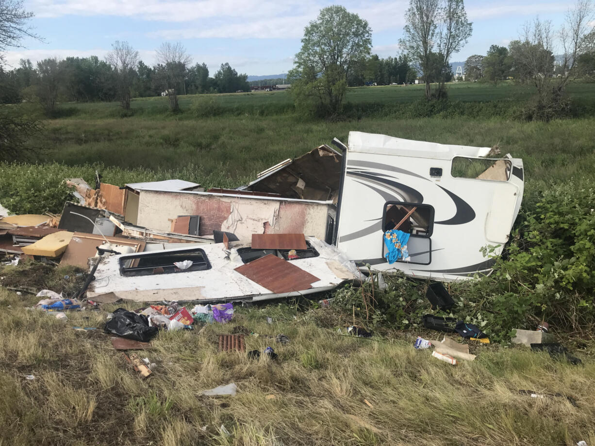 Officers responding to a fatal three-vehicle collision in the 6100 block of Lower River Road found that a travel-trailer had separated from a pickup and was down an embankment.