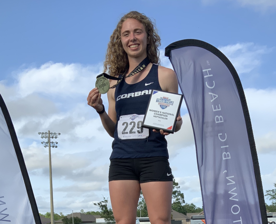 Former Prairie High School track star Valerie Schmidt holds her first-place medal after winning the heptathlon at the 2022 NAIA Outdoor Track and Field Championships on May 26 in Gulf Shores, Alabama.