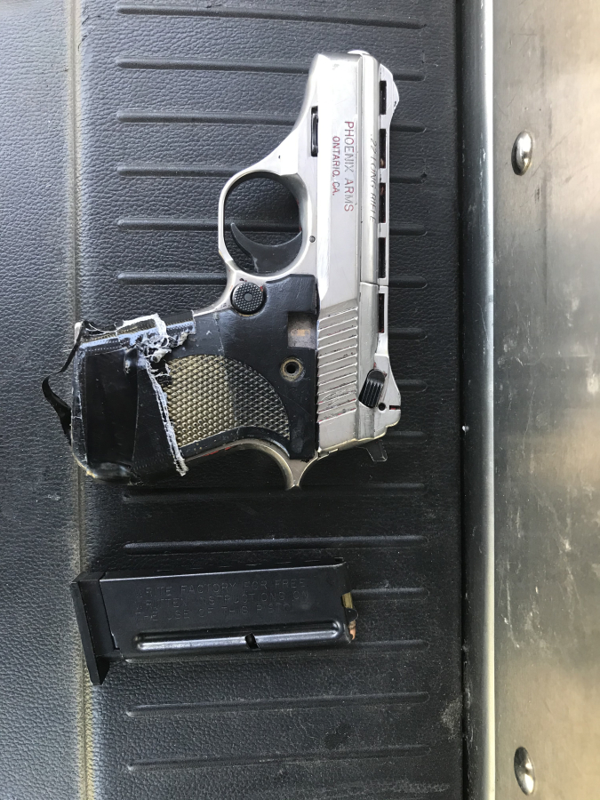 Clark County sheriff's deputies seized a semi-automatic handgun, with rounds in the magazine, Tuesday from a boy at Skyview High School after school employees allegedly found the gun in his jacket pocket.