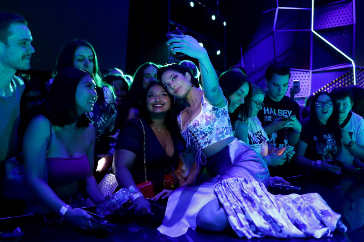 Halsey poses with fans during the 33rd Annual ARIA Awards 2019 in Sydney, Australia.