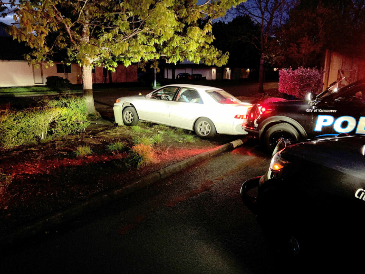 A car allegedly driven by Vancouver's Casey S. Keith became stuck on a curb when police say he tried to drive away from them in Vancouver's Bagley Downs neighborhood. Officers said they found a stolen gun in the car.