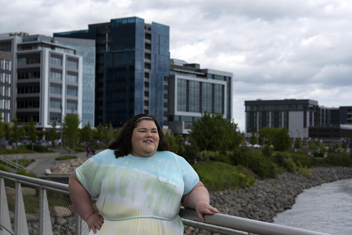 Plus-size travel blogger Jae’lynn Chaney takes a break at the Vancouver waterfront. As an “influencer,” high-profile brands pay her to review products and services.