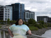Plus-size travel blogger Jae’lynn Chaney takes a break at the Vancouver waterfront. As an “influencer,” high-profile brands pay her to review products and services.