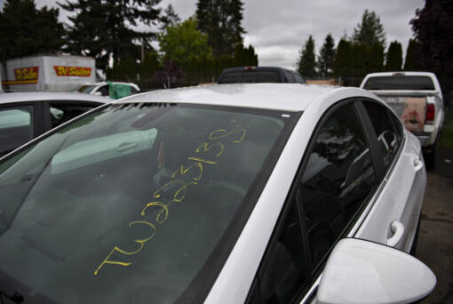 In May, a lot number with the letter "S" is seen on a vehicle at Triple J Towing to indicate it is stolen in the company's Vancouver impound lot.
