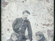 In this undated photograph, Gen. Oliver Otis Howard (1832-1909) looks down at Capt. Adams, left and Lt. Geoghegan. Howard lost his right arm in 1862 at the Battle of Seven Pines. Congress awarded him the Medal of Honor for his heroic service during the battle. He was in command of the Department of Columbia, covering the state of Oregon, the Washington Territory, Alaska and part of the Idaho Territories.