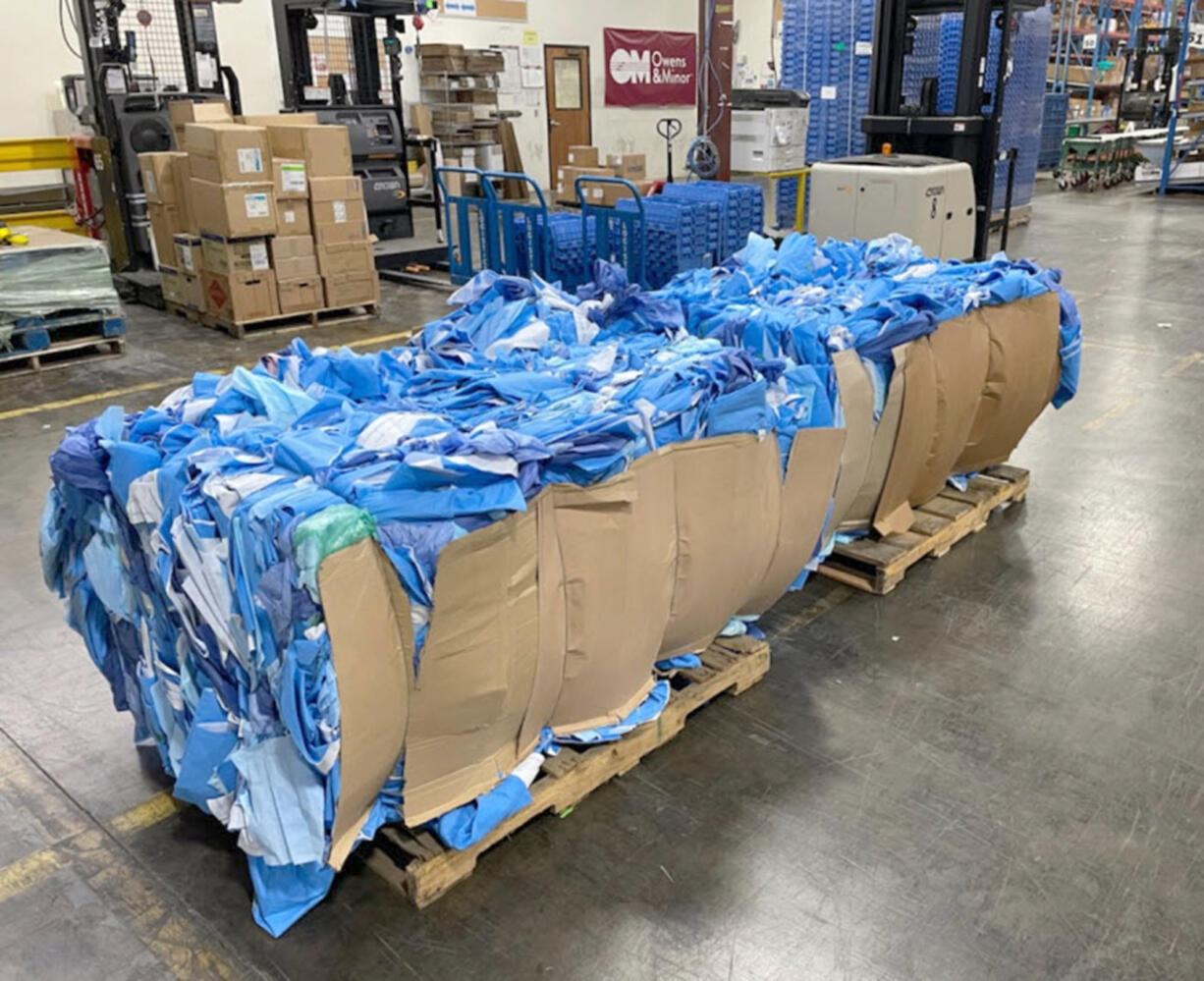 One thousand pounds of baled surgical blue wrap is prepared to be recycled. The material can be reused as hospital gowns, plastic washbasins and more.