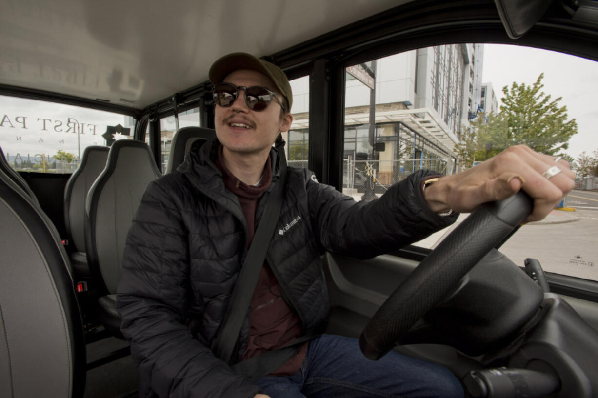 Ryd is expanding service throughout downtown Vancouver. Driver Jacob Jensen takes a short tour of the riverfront area for a photographer.