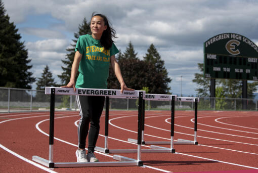 Evergreen High School senior hurdler Grace Twiss takes a break at her school?s track Monday afternoon, May 23, 2022.