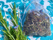 Try making fragrant sachets with herbs other than lavender by tying them in a tulle pouch. This is dried rosemary -- complete with blossoms.