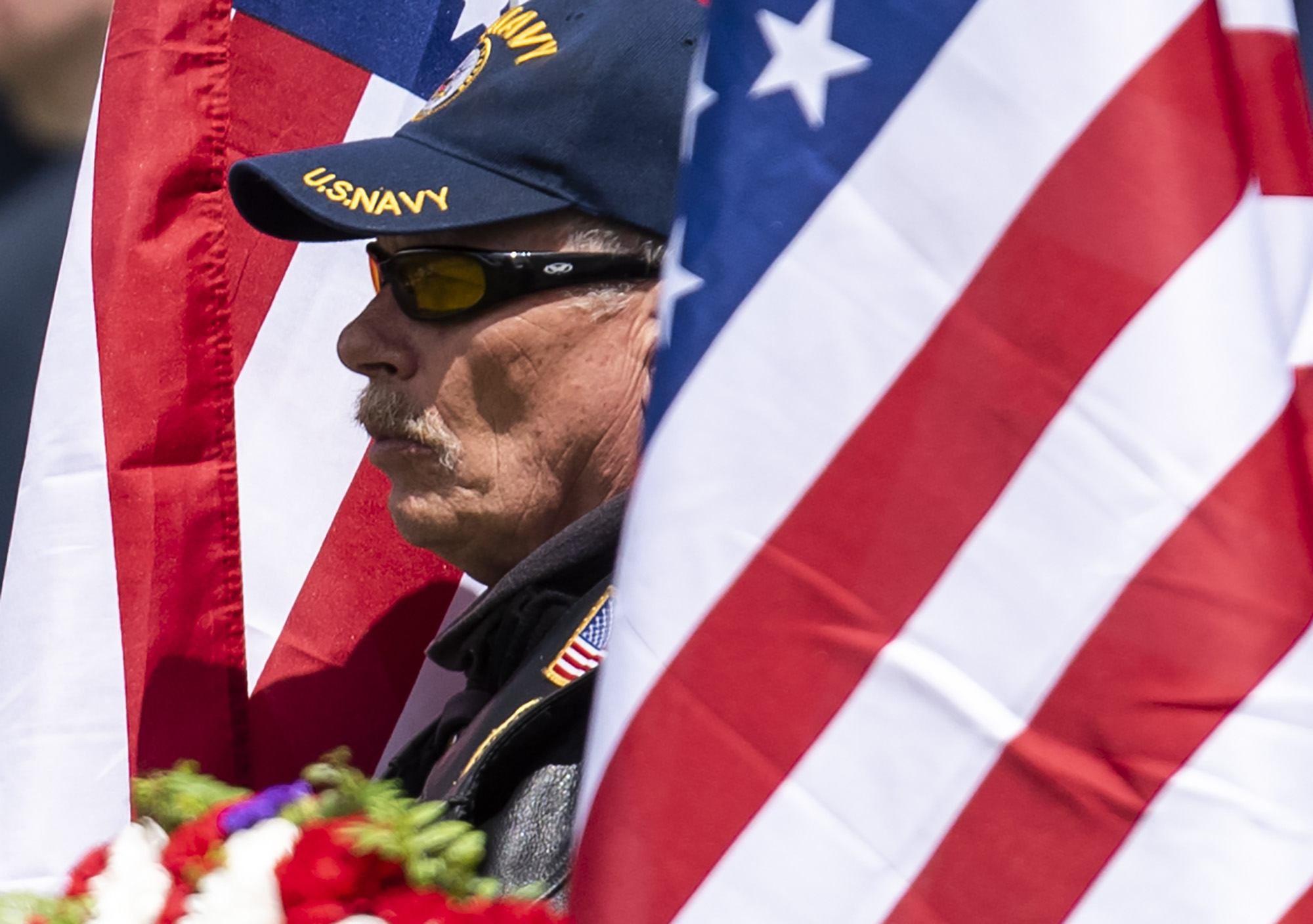 Patriot Guard member Donald Gagnon of Vancouver holds an American flag Monday, May 30, 2022, during the Memorial Day Observance event at Fort Vancouver National Historic Site.