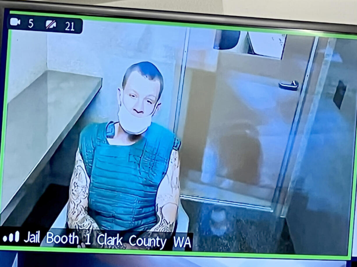 Corey D. Shenkle, 33, of Vancouver makes a first appearance Wednesday in Clark County Superior Court on suspicion of first-degree murder, possession of a stolen vehicle, hit-and-run resulting in death, driving under the influence and attempt to elude. He's accused of hitting and mortally wounding 57-year-old Larry Hicks with his SUV on April 22 in central Vancouver.