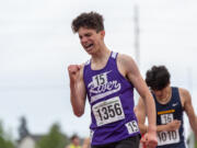 Columbia River's Daniel Barna pumps his fist after taking third in the 2A Boys 1600-meter run finals at the 2A/3A/4A State Track and Field Championships on Thursday, May 26, 2022, at Mount Tahoma High School in Tacoma.