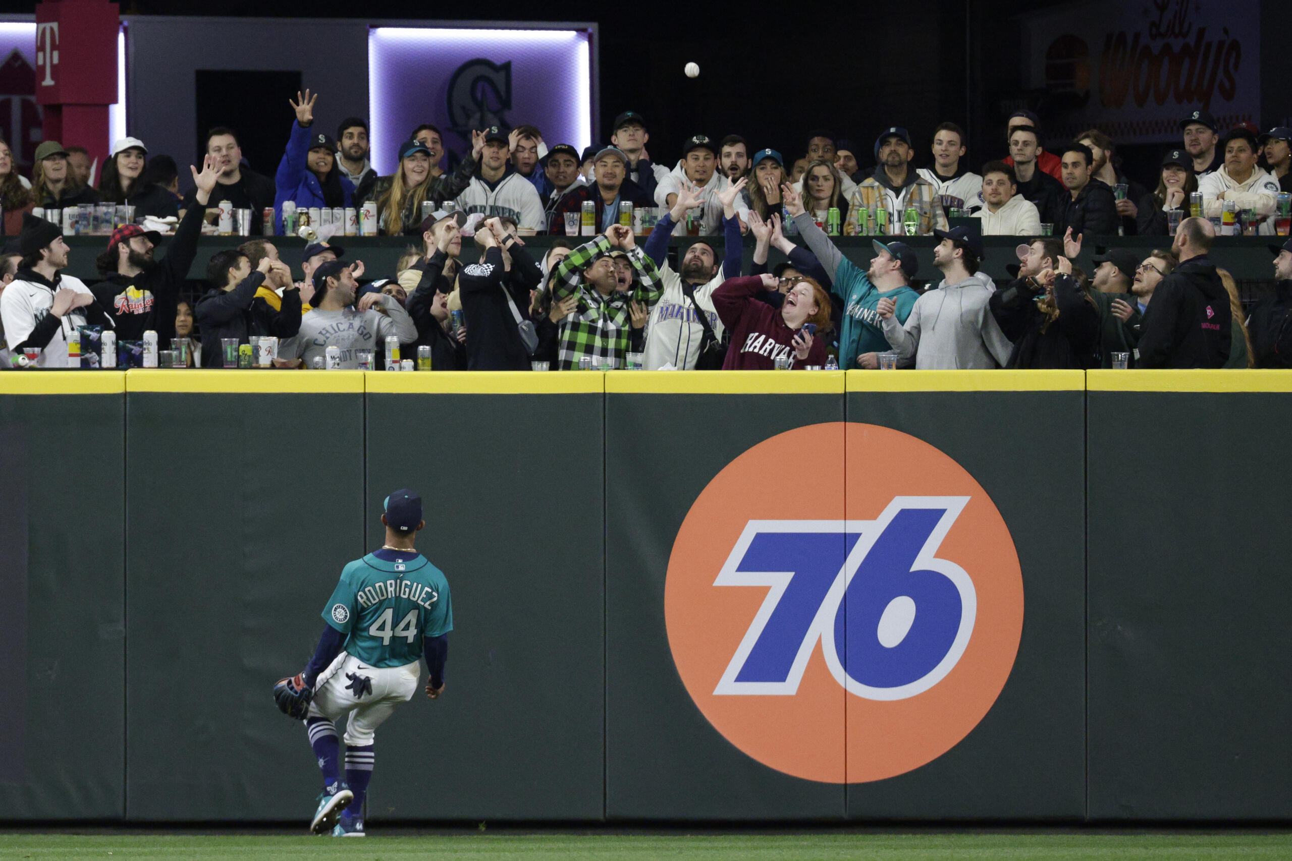 Seattle Mariners center fielder Julio Rodriguez watches as Tampa Bay Rays' Manuel Margot's three-run home run ball lands in the stands in the ninth inning of a baseball game, Friday, May 6, 2022, in Seattle. The Rays won 8-7.