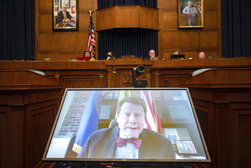 Food and Drug Administration Commissioner Robert Califf testifies via video during a House Commerce Oversight and Investigations subcommittee hybrid hearing on the nationwide baby formula shortage on Wednesday, May 25, 2022, in Washington.
