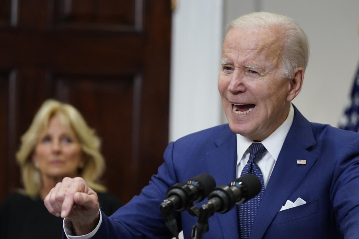 President Joe Biden speaks about the mass shooting at Robb Elementary School in Uvalde, Texas, from the White House, in Washington, Tuesday, May 24, 2022, as first lady Jill Biden listens.