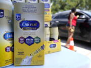 Katherine Gibson-Haynes helps distribute infant formula during a baby formula drive Saturday, May 14, 2022, in Houston. Parents seeking baby formula are running into bare supermarket and pharmacy shelves in part because of ongoing supply disruptions and a recent safety recall. (AP Photo/David J.
