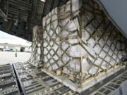 The 132 pallets of Nestl? Health Science Alfamino Infant and Alfamino Junior formula are shown in the cargo hold of a C-17 plane at the Indianapolis International Airport in Indianapolis, Sunday, May 22, 2022.