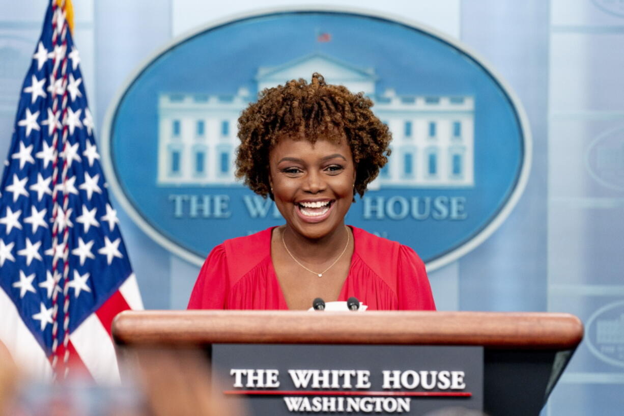 White House press secretary Karine Jean-Pierre laughs during her first press briefing as press secretary at the White House in Washington, Monday, May 16, 2022.