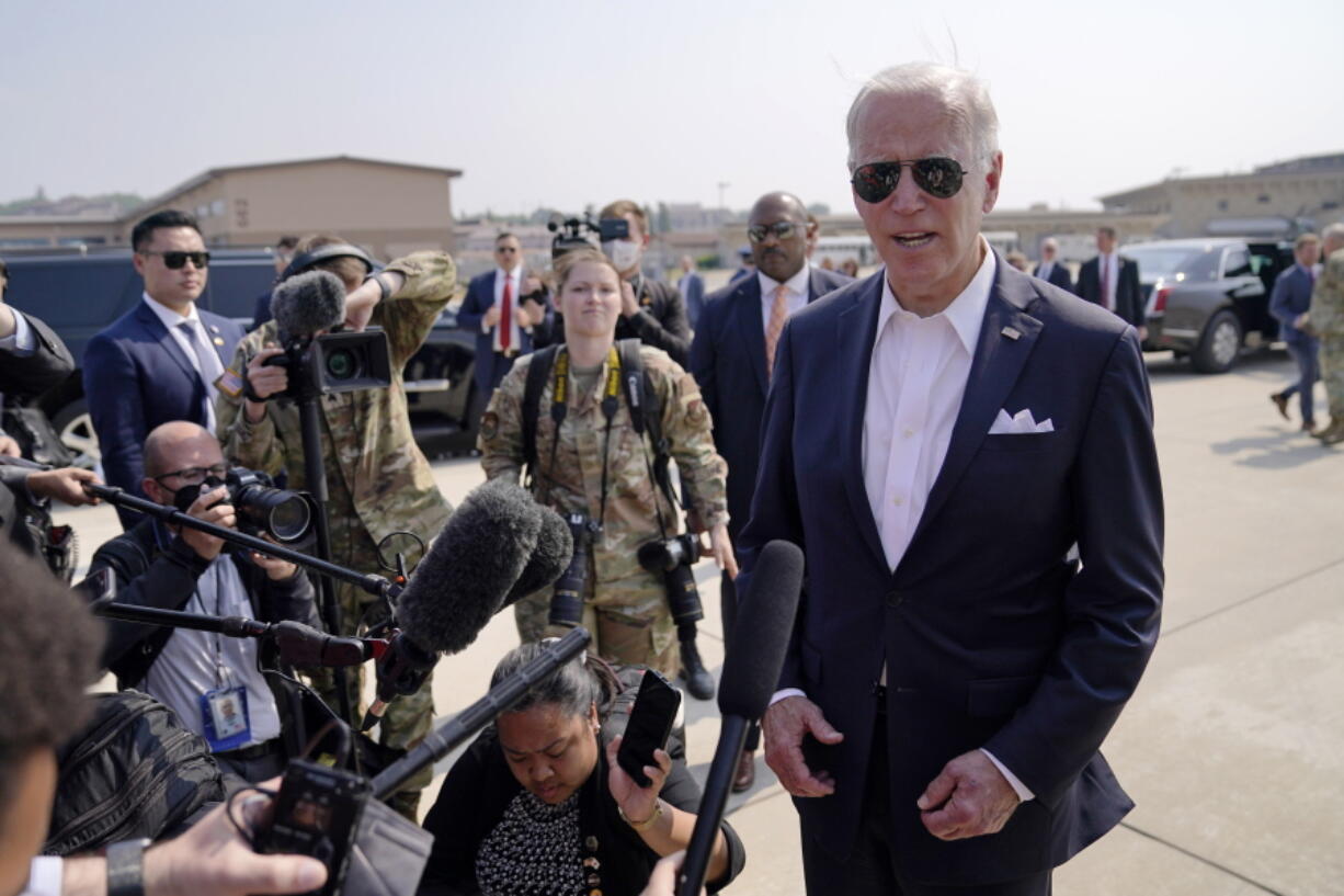U.S. President Joe Biden speaks before boarding Air Force One for a trip to Japan at Osan Air Base, Sunday, May 22, 2022, in Pyeongtaek, South Korea.