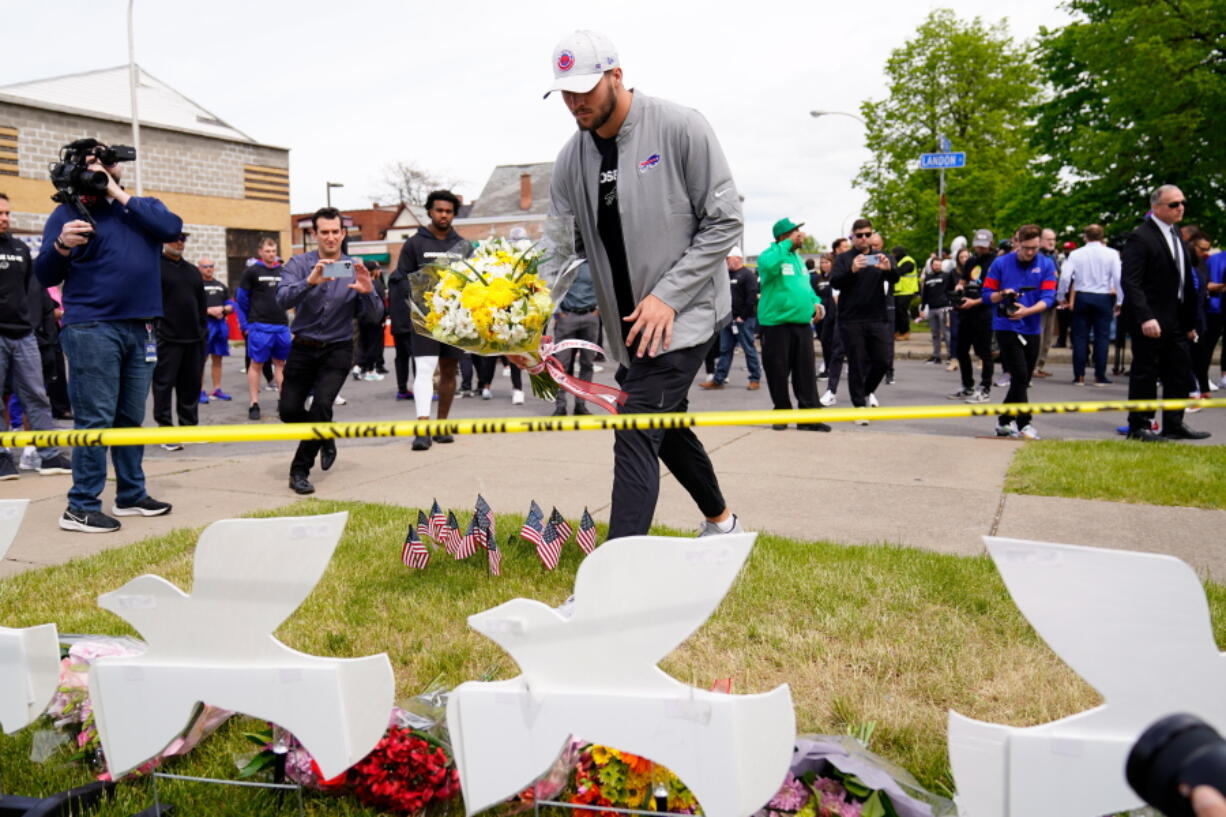 Buffalo Bills' Josh Allen visits the scene of Saturday's shooting at a supermarket, in Buffalo, N.Y., Wednesday, May 18, 2022.