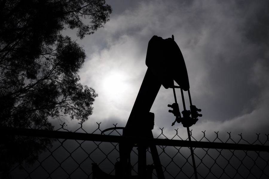 A pumpjack operates on Jan. 15, 2015, in Bakersfield, Calif. Residents of Bakersfield are concerned about potential explosions after a state agency found that six idle oil wells near homes were leaking methane in the past several days.  (AP Photo/Jae C.
