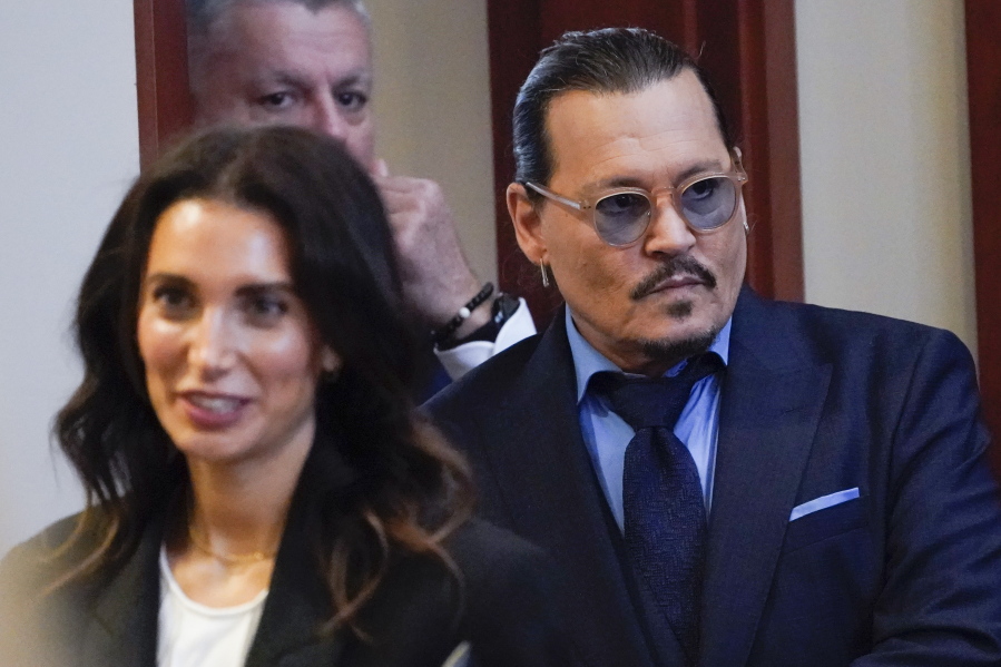 Actor Johnny Depp arrives in the courtroom for closing arguments at the Fairfax County Circuit Courthouse in Fairfax, Va., Monday, May 27, 2022.