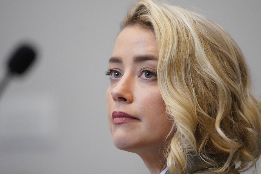 Actor Amber Heard listens in the courtroom at the Fairfax County Circuit Courthouse in Fairfax, Va., Monday, May 23, 2022.