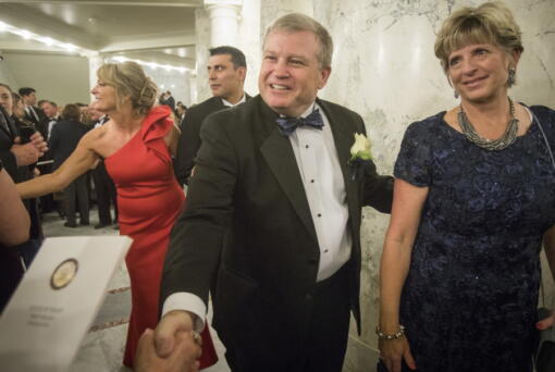 FILE - Idaho Attorney General Lawrence Wasden and his wife, Tracey Wasden, attend the Inaugural Procession and Ball on Jan. 5, 2019, in Boise, Idaho. Wasden is seeking a sixth term as state attorney general. Idaho's primary elections are Tuesday, May 17, 2022.