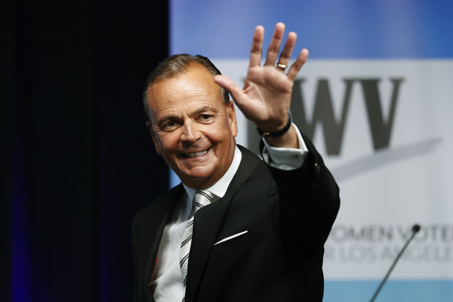 FILE - Businessman Rick Caruso waves at the start of a mayoral debate at the Student Union Theater on the California State University, Los Angeles campus on Sunday, May 1, 2022. Los Angeles is a heavily Democratic city, but voters this year could take a right turn. Caruso, a billionaire former longtime Republican who sits on the Ronald Reagan Presidential Foundation board, is a leading candidate for mayor and is promising to expand, not defund, police.