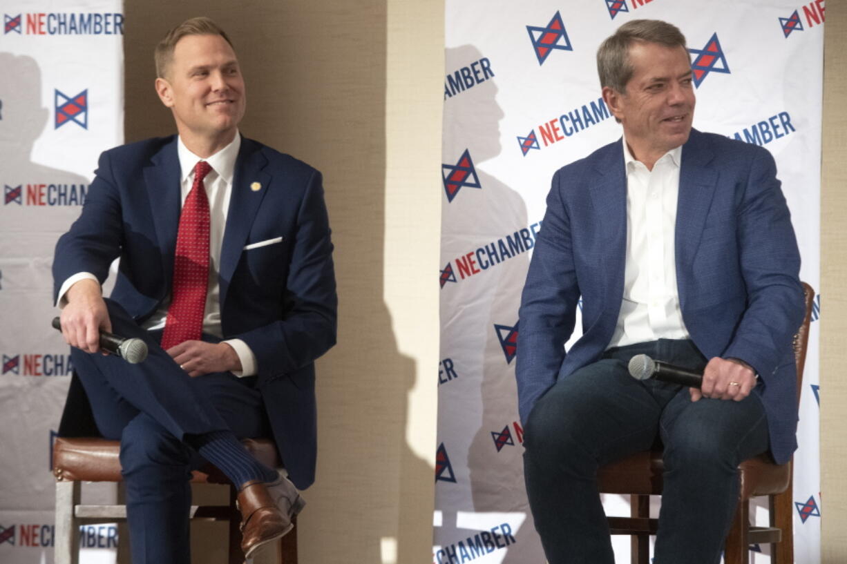 FILE - Nebraska Republican gubernatorial candidates Brett Lindstrom, left, and Jim Pillen attend a candidate forum Feb. 3, 2022, in Lincoln, Neb. The top race in Tuesday's primary elections in Nebraska and West Virginia is a heavily contested Republican primary.