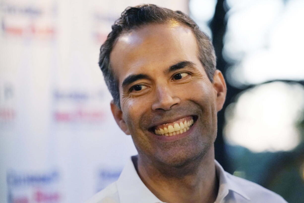 FILE - Republican Texas Land Commissioner George P. Bush makes a campaign stop, Feb. 10, 2022, in Austin, Texas. Bush is running for attorney general in Texas' Republican primary runoff election against Texas Attorney General Ken Paxton on Tuesday, May 24, 2022.