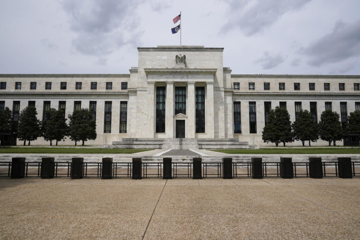 FILE - In this May 4, 2021 file photo is the Federal Reserve in Washington. Americans' financial health reached its highest level in nearly a decade last year, the Federal Reserve said Monday, May 23, 2022 spurred by a strong job market and government support payments.