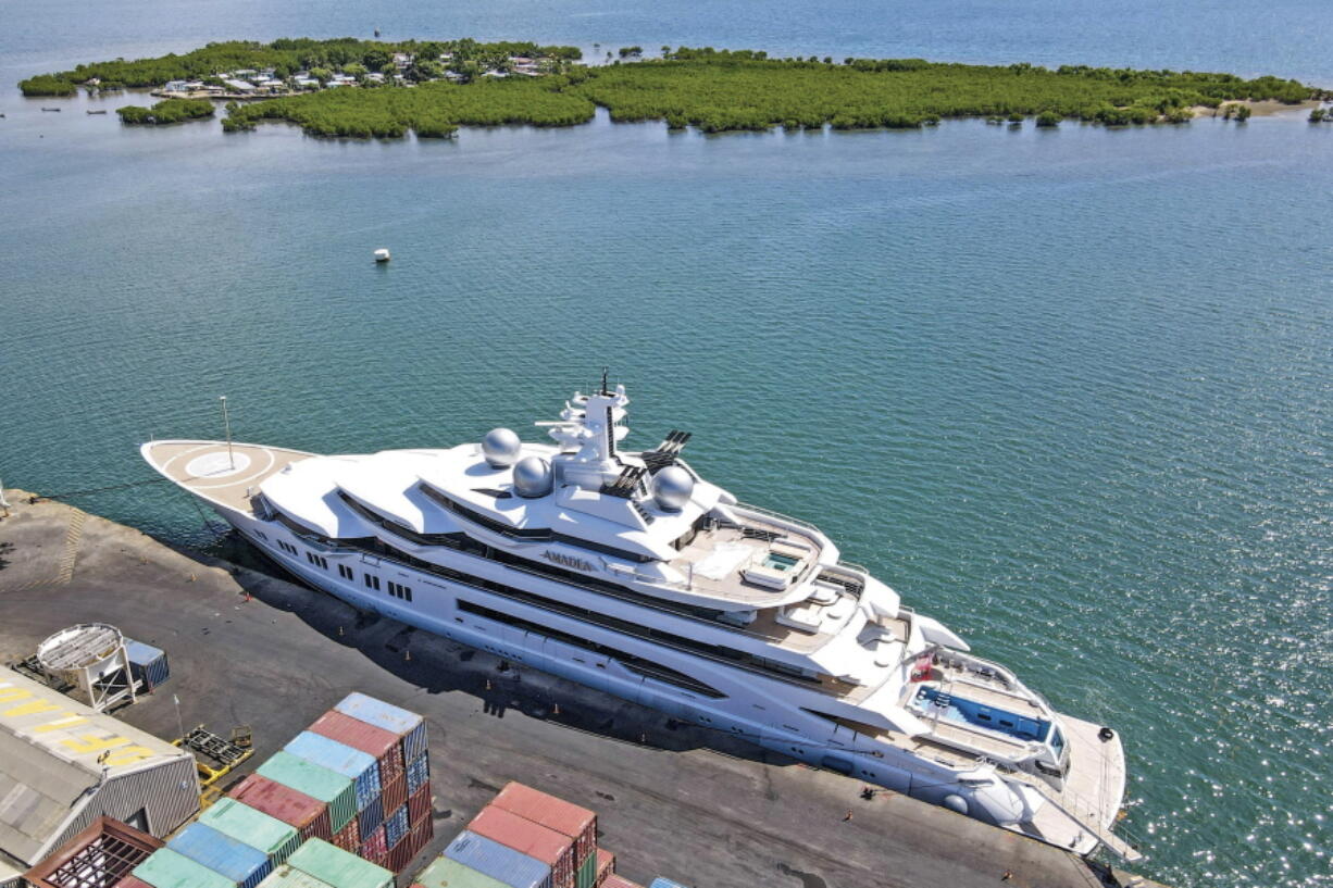 FILE - The superyacht Amadea is docked at the Queens Wharf in Lautoka, Fiji, on April 15 2022. On May 5, five U.S. federal agents boarded the massive Russian-owned superyacht Amadea that was berthed in Lautoka harbor in Fiji in a case that is highlighting the thorny legal ground the U.S. is finding itself on as it tries to seize assets of Russian oligarchs around the world.