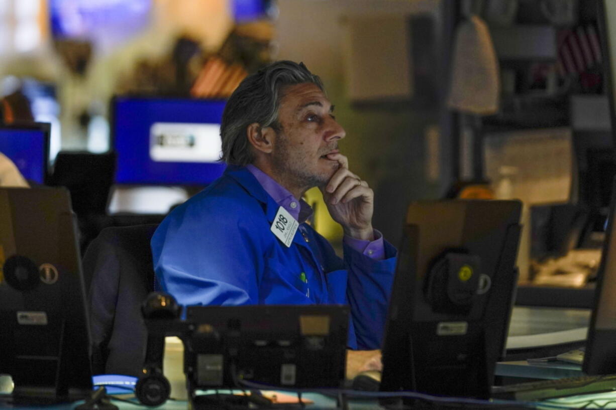 A trader works on the floor at the New York Stock Exchange in New York, Thursday, May 19, 2022. Stocks fell in morning trading on Wall Street Thursday, deepening a slump for major indexes as persistently high inflation continues to weigh on the economy.