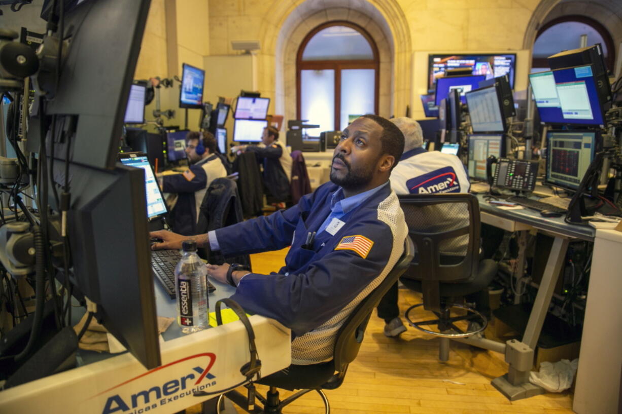 Traders work on the New York Stock Exchange floor in New York City on Friday, May 20, 2022.