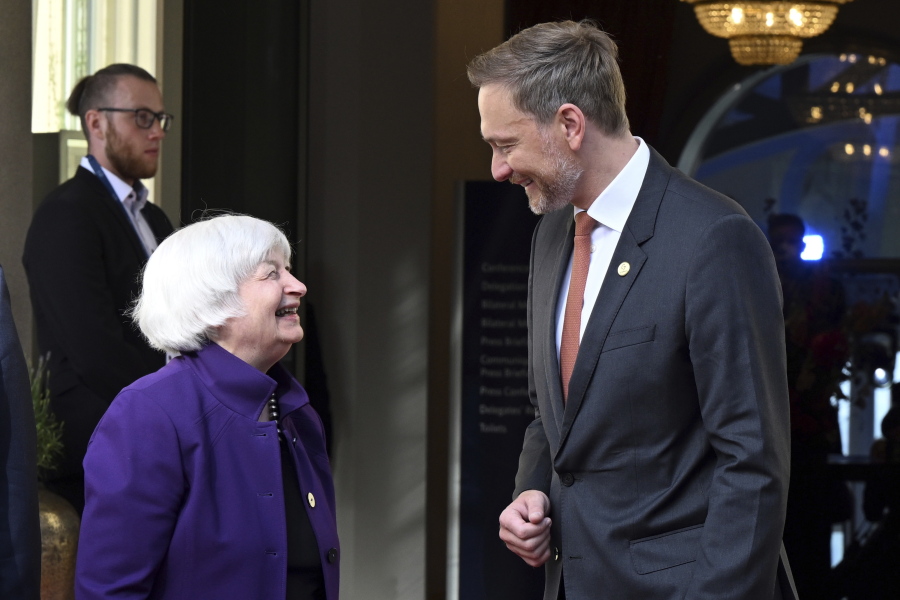 German Finance Minister Christian Lindner, right,  welcomes U.S. Treasury Secretary  Janet Yellen, front left, for a G7 Finance Ministers Meeting at the federal guest house Petersberg, near Bonn, Germany, Thursday, May 19, 2022.