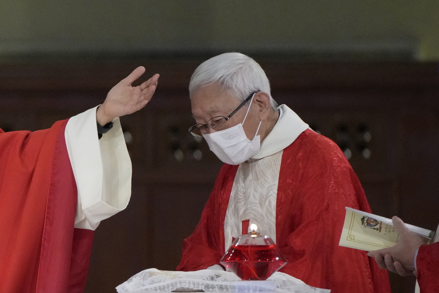 Retired archbishop of Hong Kong Joseph Zen, attends the episcopal ordination ceremony of Bishop Stephen Chow, in Hong Kong, Saturday, Dec. 4, 2021. Zen, the 90-year-old Catholic cleric arrested by Hong Kong police on national security charges, has long been a fiery critic of Beijing, along with efforts by the Vatican to reach a working arrangement with the ruling Communist Party.