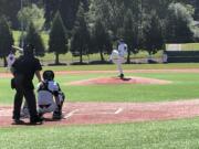 Camas starting pitcher Ethan Hubbell throws against Issaquah in the 4A state baseball regionals on Saturday in Lacey.