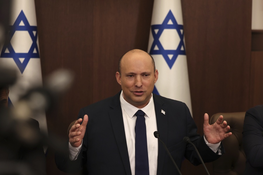 FILE - Israeli Prime Minister Naftali Bennett speaks during a weekly cabinet meeting in Jerusalem on Sunday, May 1, 2022. Bennett says he accepted an apology from Russian President Vladimir Putin for controversial remarks about the Holocaust made by Moscow's top diplomat. But there was no mention of an apology in the Russian statement on Thursday, May 4,  call between the two leaders.