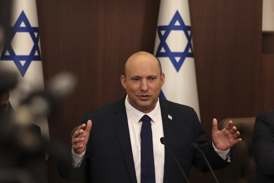 FILE - Israeli Prime Minister Naftali Bennett speaks during a weekly cabinet meeting in Jerusalem on Sunday, May 1, 2022. Less than a year after taking office, Bennett has lost his parliamentary majority, his own party is crumbling and a key governing partner has suspended cooperation with the coalition.