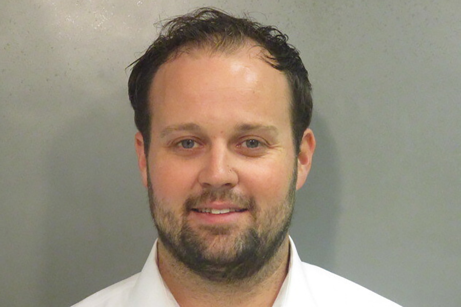 This undated photo provided by Washington County (Ark), Detention Center shows Josh Duggar. The former reality TV star is returning to federal court in Arkansas, where a judge could sentence him to up to 20 years in prison for receiving and possessing child pornography. Prosecutors on Wednesday, May 25, 2022 are seeking a maximum sentence for Duggar, whose large family was the focus of TLC's "19 Kids and Counting" reality show.