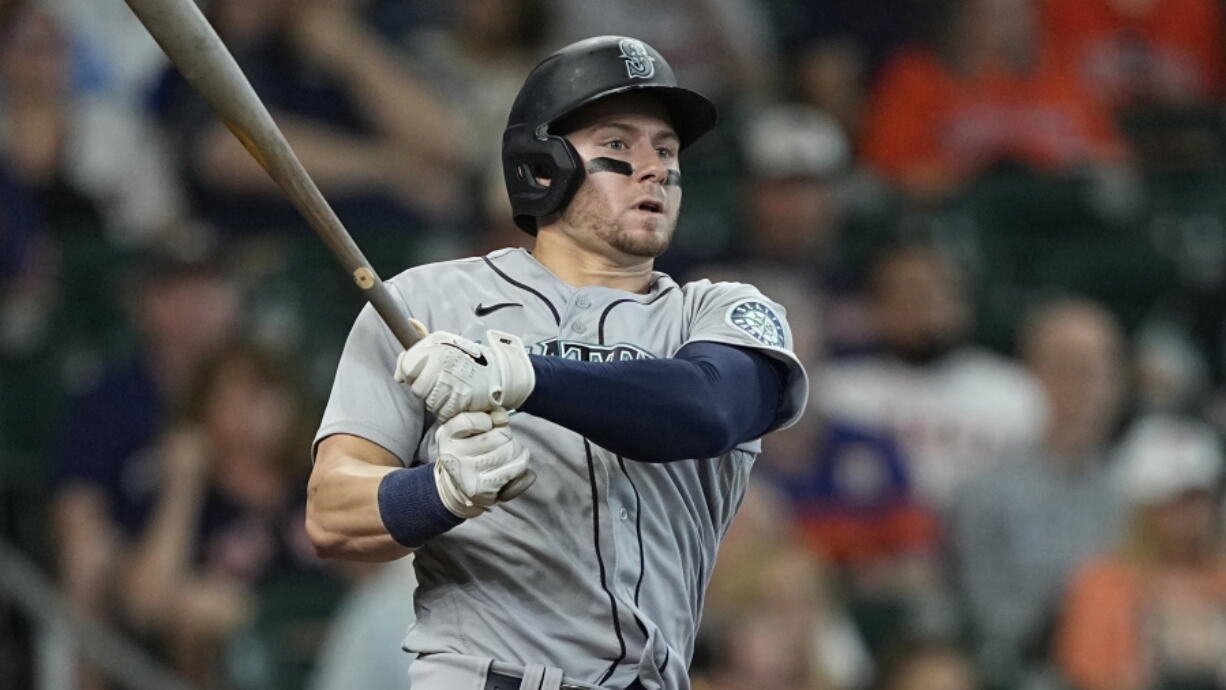 Seattle Mariners' Jarred Kelenic bats against the Houston Astros during the third inning of a baseball game Wednesday, May 4, 2022, in Houston. (AP Photo/David J.