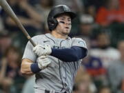 Seattle Mariners' Jarred Kelenic bats against the Houston Astros during the third inning of a baseball game Wednesday, May 4, 2022, in Houston. (AP Photo/David J.