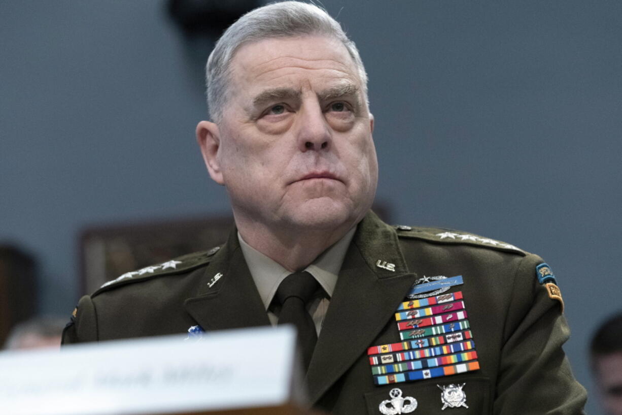 FILE - Chairman of the Joint Chiefs of Staff Gen. Mark Milley testifies before the House Committee on Appropriations Subcommittee on Defense during a hearing for the Fiscal Year 2023 Department of Defense, on Capitol Hill in Washington, May 11, 2022. In prepared remarks, Milley painted a grim picture of a world that is becoming more unstable, with great powers intent on changing the global order. And he told graduating cadets at the U.S. Military Academy at West Point that they will bear the responsibility to make sure America is prepared.