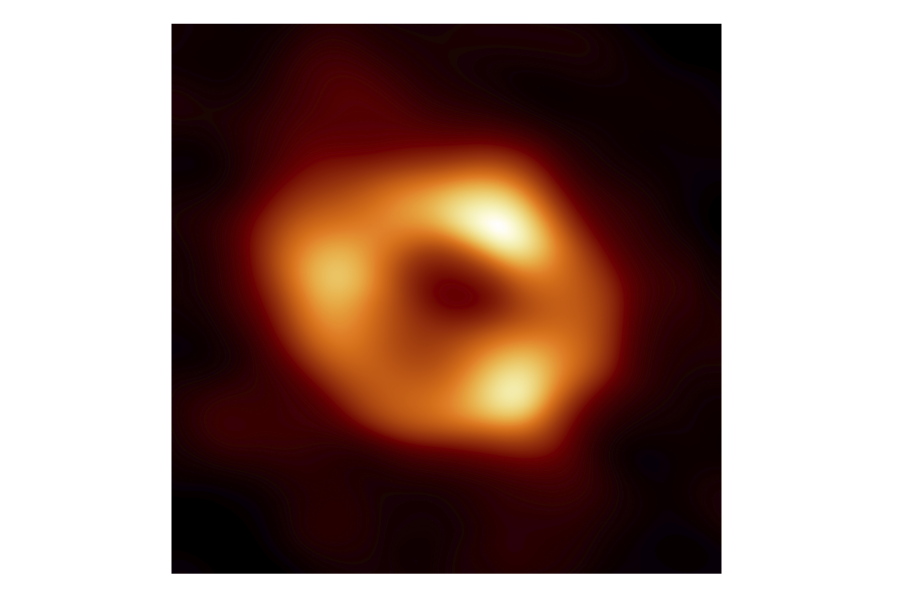 This image released by the Event Horizon Telescope Collaboration, Thursday, May 12, 2022, shows a black hole at the center of our Milky Way galaxy. The Milky Way black hole is called Sagittarius A*, near the border of Sagittarius and Scorpius constellations. It is 4 million times more massive than our sun. The image was made by eight synchronized radio telescopes around the world.