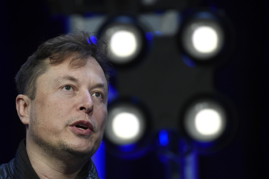 FILE - Elon Musk speaks at the SATELLITE Conference and Exhibition March 9, 2020, in Washington. On Tuesday, May 10, 2022, Musk said he would reverse Twitter's ban of former President Donald Trump, who was booted in January 2021 for inciting violence at the U.S. Capitol, should he succeed in acquiring the social platform for $44 billion.